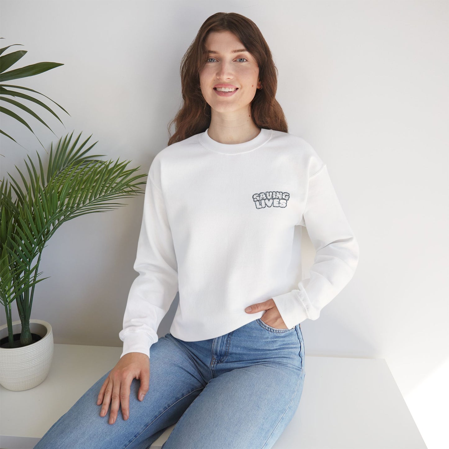 Saving Lives Crewneck Sweatshirt - Unisex Heavy Blend™