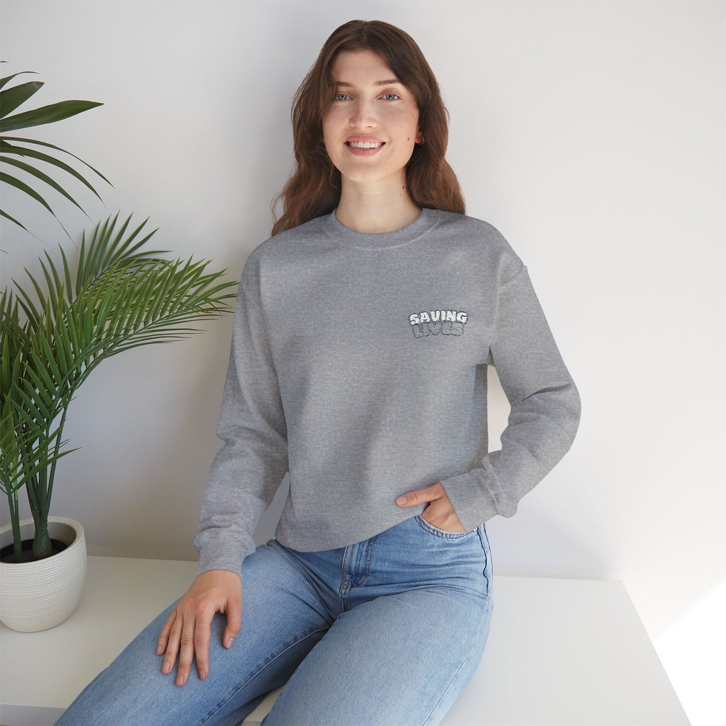 Saving Lives Crewneck Sweatshirt - Unisex Heavy Blend™